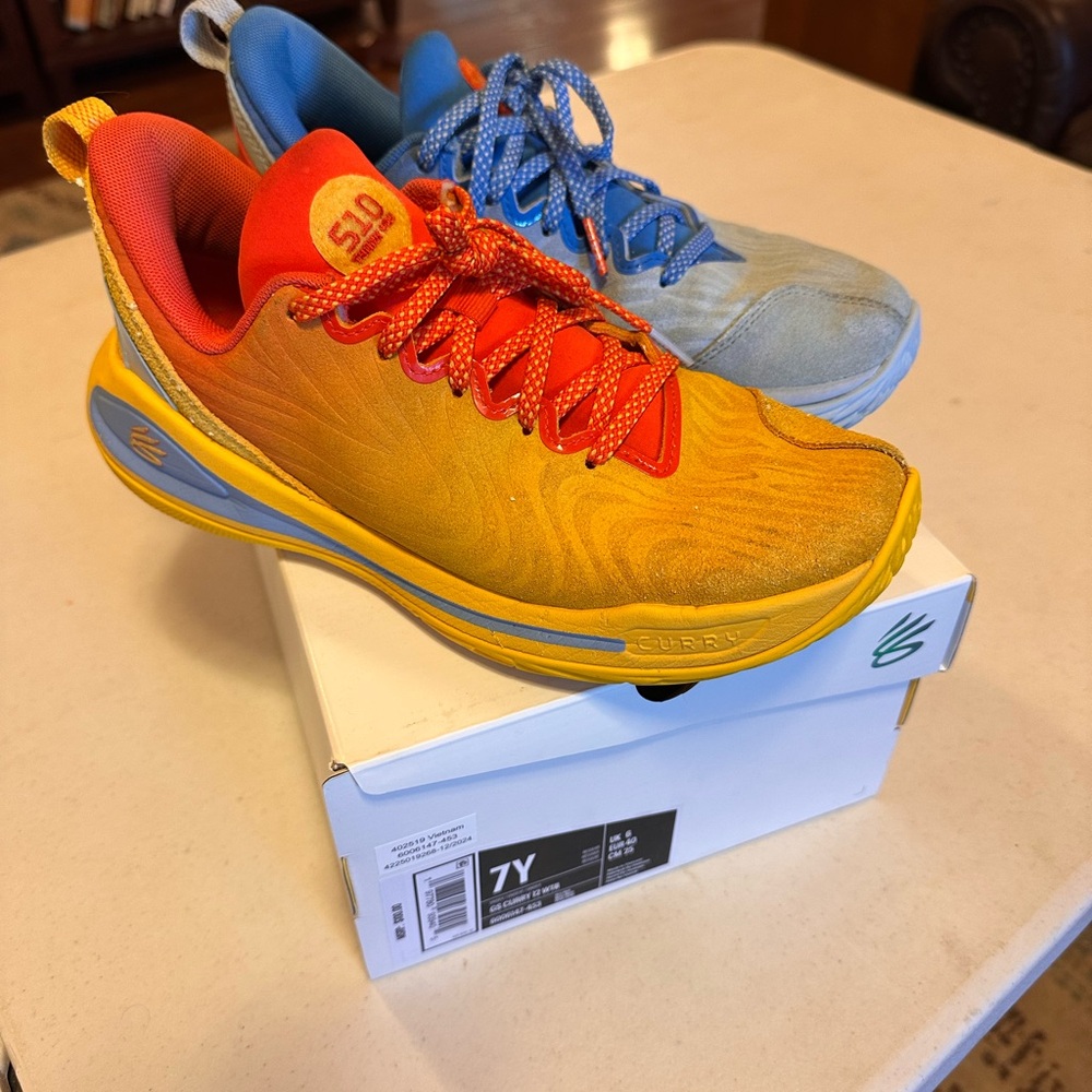 Curry Under Armour  orange and blue basketball shoes